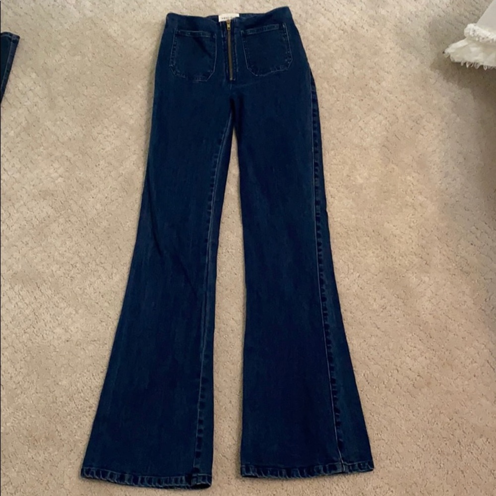 Dark wash bell bottom jean.